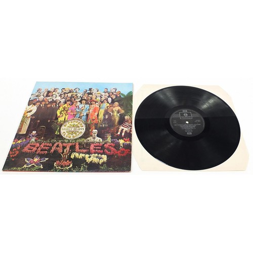 1390 - Five Sgt Pepper's Lonely Hearts Club Band vinyl LP records by The Beatles with cut outs, four stereo... 