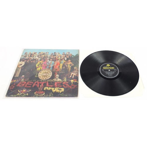 1390 - Five Sgt Pepper's Lonely Hearts Club Band vinyl LP records by The Beatles with cut outs, four stereo... 