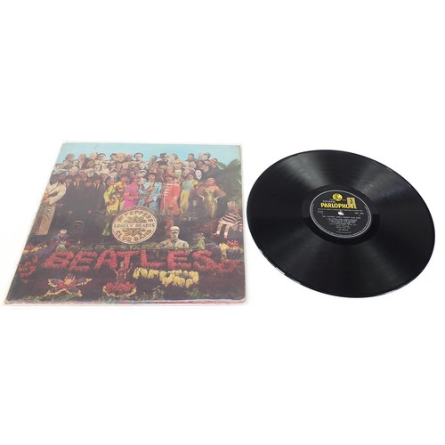 1391 - Seven Sgt Pepper's Lonely Hearts Club Band vinyl LP records by The Beatles, six mono, one stereo, ea... 