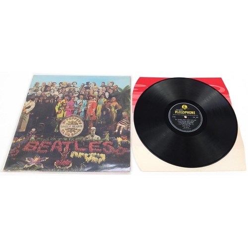 1391 - Seven Sgt Pepper's Lonely Hearts Club Band vinyl LP records by The Beatles, six mono, one stereo, ea... 