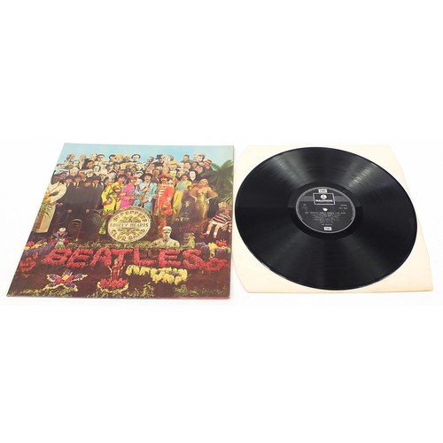 1388 - Seven Sgt Pepper's Lonely Hearts Club Band vinyl LP records by The Beatles, five stereo, two mono, e... 