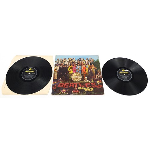 1388 - Seven Sgt Pepper's Lonely Hearts Club Band vinyl LP records by The Beatles, five stereo, two mono, e... 