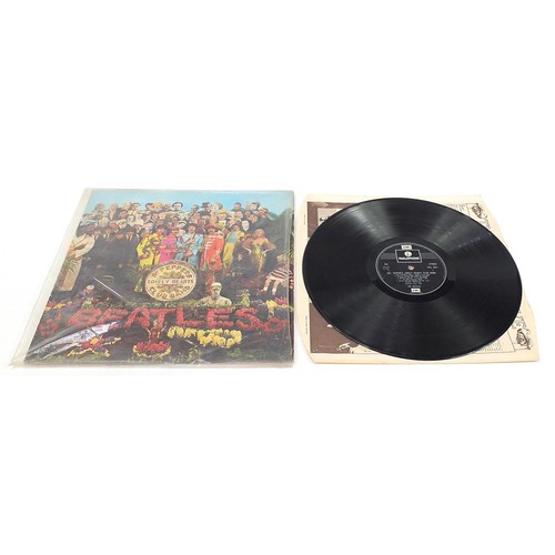 1388 - Seven Sgt Pepper's Lonely Hearts Club Band vinyl LP records by The Beatles, five stereo, two mono, e... 