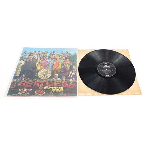 1388 - Seven Sgt Pepper's Lonely Hearts Club Band vinyl LP records by The Beatles, five stereo, two mono, e... 