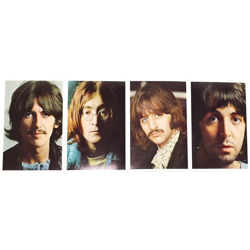 1386 - Four White Album vinyl LP records by The Beatles with posters and photographs comprising numbers 043... 