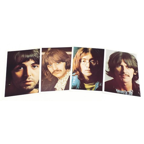 1385 - Four White Album vinyl LP records by The Beatles with poster and four pictures to include numbers 36... 