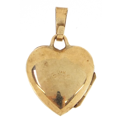 1914 - 9ct gold love heart locket set with a diamond, 2cm high, 1.3g