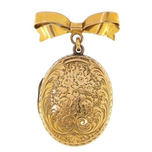 1819 - Victorian gilt metal locket engraved with flowers and foliage on a yellow metal bow brooch fitting, ... 