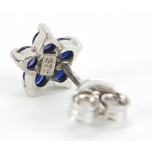 1953 - Pair of 9ct white gold diamond and sapphire flower head stud earrings, 7mm high, 0.8g