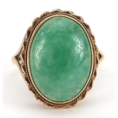 1705 - 9ct gold green cabochon hardstone ring, size R, 5.9g