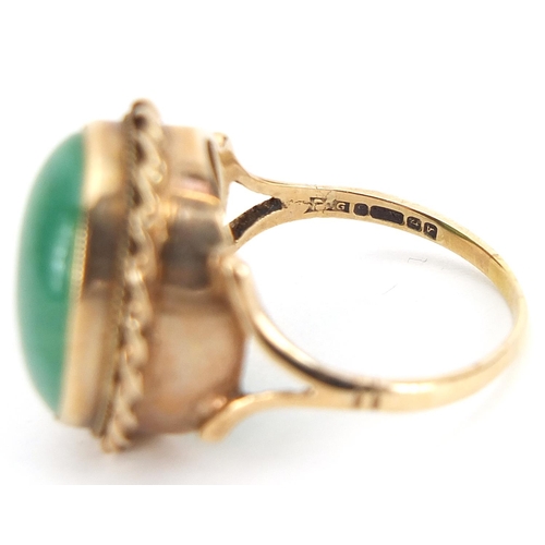 1705 - 9ct gold green cabochon hardstone ring, size R, 5.9g