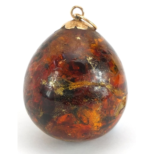 1891 - Natural amber pendant with unmarked gold mount, 3.2cm high, 15.0g