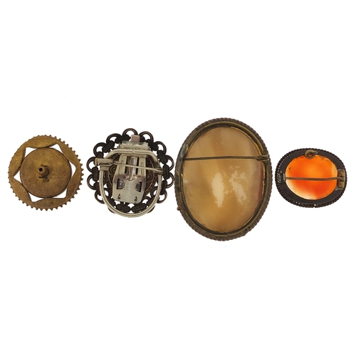 2141 - Four antique and later brooches including a cameo maiden head, micro mosaic and carnelian, the large... 