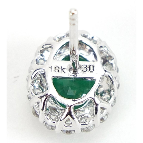 1840 - Pair of 18ct white gold emerald and diamond cluster stud earrings, total emerald weight approximatel... 