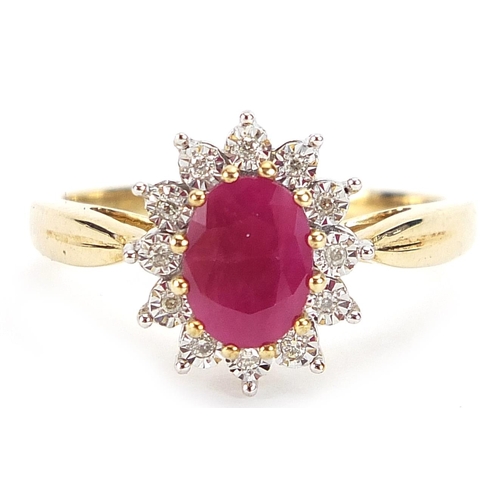 1751 - 9ct gold ruby and diamond cluster ring, the ruby approximately 0.92 carat, total diamond weight appr... 