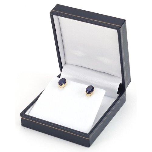 1809 - Pair of 18ct gold sapphire and diamond stud earrings, total sapphire weight approximately 3.00 carat... 