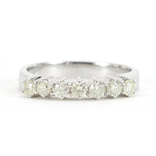 1835 - 18ct white gold diamond seven stone half eternity ring with WGI gemological report, total diamond we... 