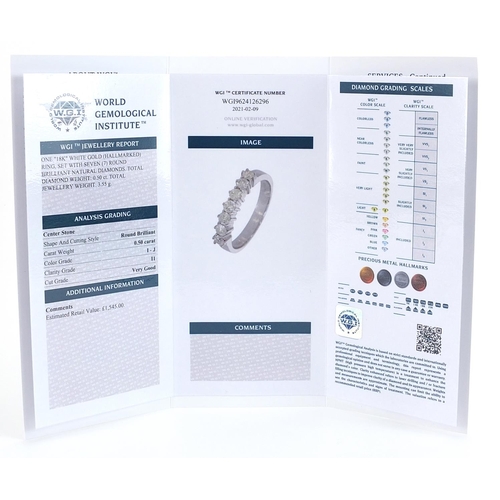 1835 - 18ct white gold diamond seven stone half eternity ring with WGI gemological report, total diamond we... 