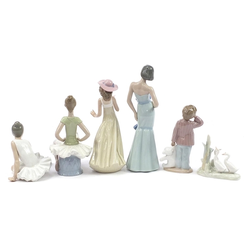 555 - Six Lladro and Nao porcelain figures and ducks, the largest 30cm high