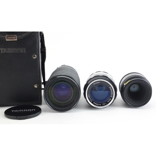 363 - Five camera lenses comprising Tamron 60-300mm with case and four Nikon Nikkor 135mm, 55mm, 55mm and ... 