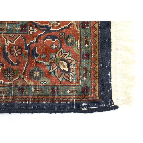 840 - Rectangular blue ground rug having an all over geometric floral design, 205cm x 145cm