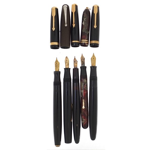 183 - Five vintage fountain pens, four with gold nibs including three Parker