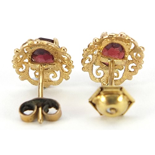 1936 - Pair of 9ct gold garnet stud earrings, 12mm high, 1.6g