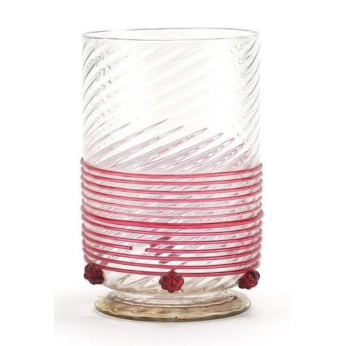 467 - Italian writhen glass cup with cranberry trailed decoration, 12cm high