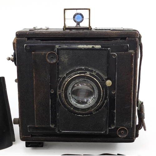 361 - Vintage Peeling & Van Neck plate camera with a collection of plates including Zeiss Ikon, each plate... 