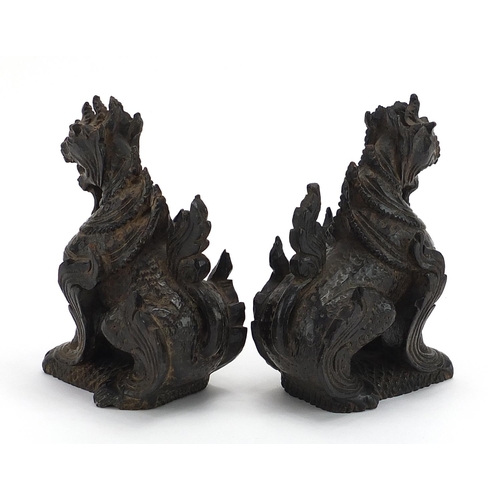 629 - Pair of Burmese carved wood dragons, each 14.5cm high