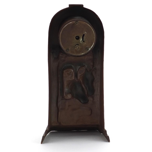 1166 - Art Deco style bronzed mantle clock decorated with two horse heads, the circular dial with Arabic nu... 