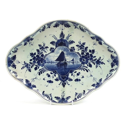 993 - Delft blue and white tin glazed tray hand painted with a sailing boat and flowers, 42cm wide