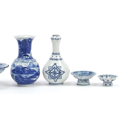 1133 - Chinese blue and white porcelain including garlic head vase and five pedestal dishes hand painted wi... 