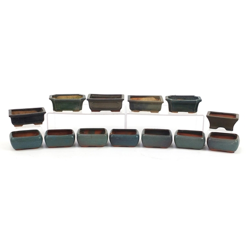 998 - Thirteen Chinese stoneware bonsai planters having various green glazes, the largest each 14.5cm in l... 