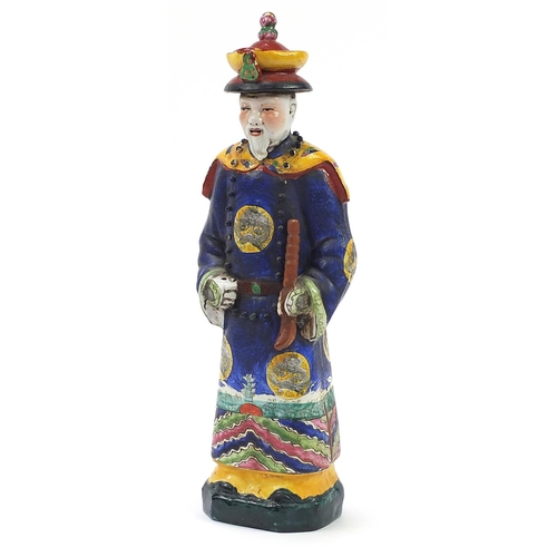 1009 - Chinese porcelain figure of a scholar wearing a robe, impressed marks to the base, 45cm high