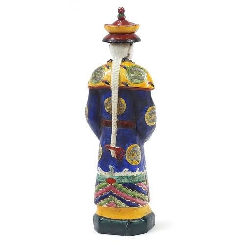 1009 - Chinese porcelain figure of a scholar wearing a robe, impressed marks to the base, 45cm high