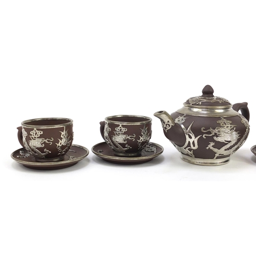 996 - Chinese Yixing terracotta four place tea service with pewter dragon design overlay, various impresse... 