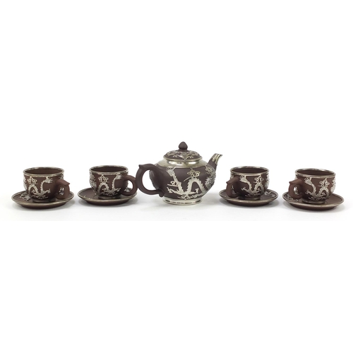 996 - Chinese Yixing terracotta four place tea service with pewter dragon design overlay, various impresse... 