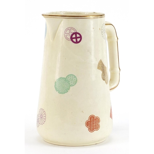 1010 - Aesthetic oriental ivory jug hand painted with stylised motifs in the manner of Christopher dresser,... 