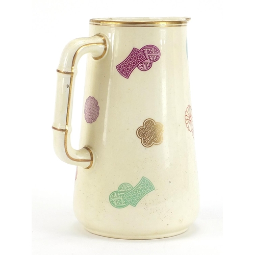 1010 - Aesthetic oriental ivory jug hand painted with stylised motifs in the manner of Christopher dresser,... 