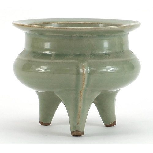 426 - Chinese porcelain tripod incense burner having a celadon glaze, 13cm high x 15.5cm in diameter