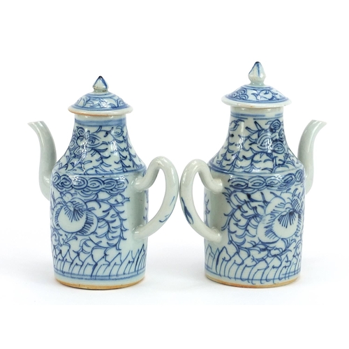 343 - Pair of Chinese blue and white porcelain coffee pots hand painted with flowers, each 15cm high