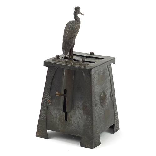 464 - Arts & Crafts hammered copper cigarette dispenser surmounted with a heron, inset with a Ruskin type ... 