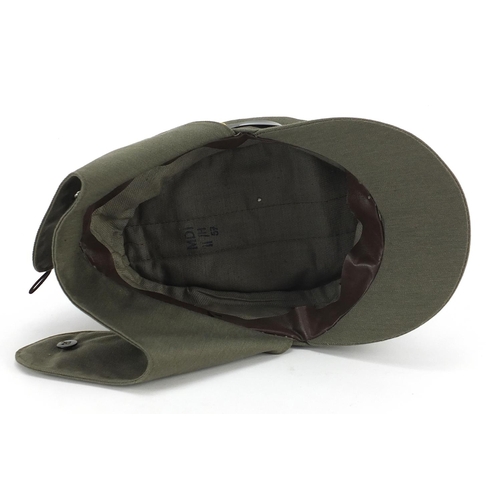 2346 - German military interest peaked cap with badge, stamped to the interior