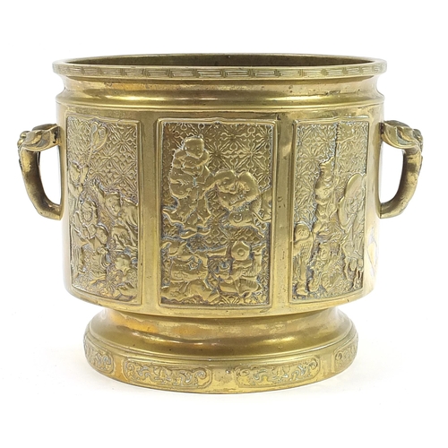 95 - Chinese patinated bronze planter with twin handles decorated with panels of children playing, 23.5cm... 