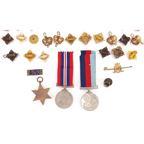 2316 - British military World War II and later militaria including three World War II medals and buttons