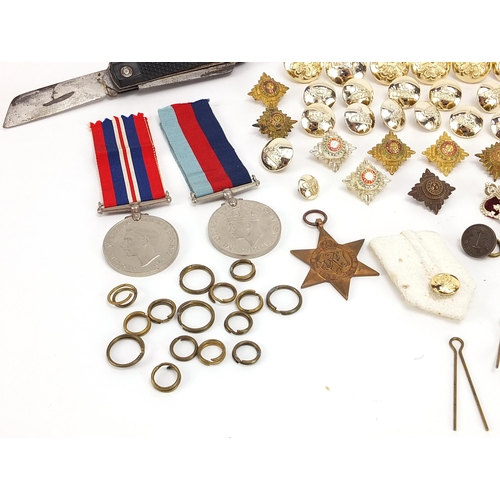 2316 - British military World War II and later militaria including three World War II medals and buttons