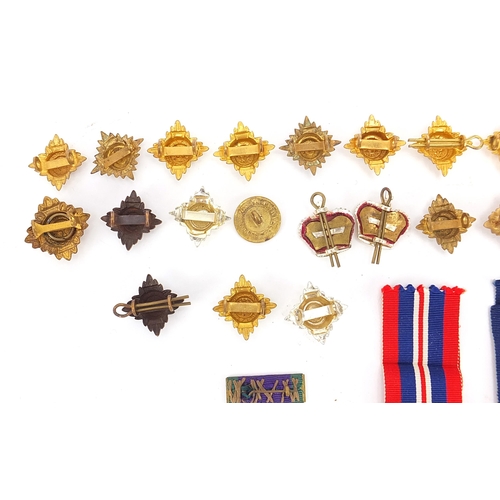 2316 - British military World War II and later militaria including three World War II medals and buttons