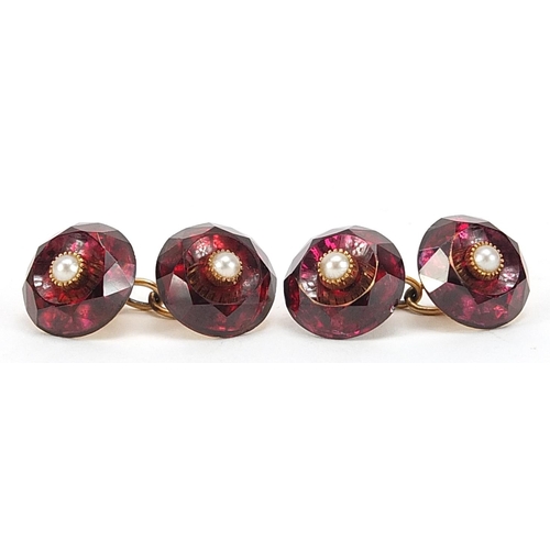 1698 - Pair of unmarked gold facetted garnet coloured and pearl cufflinks, (tests as 9ct gold) 1.2cm in dia... 