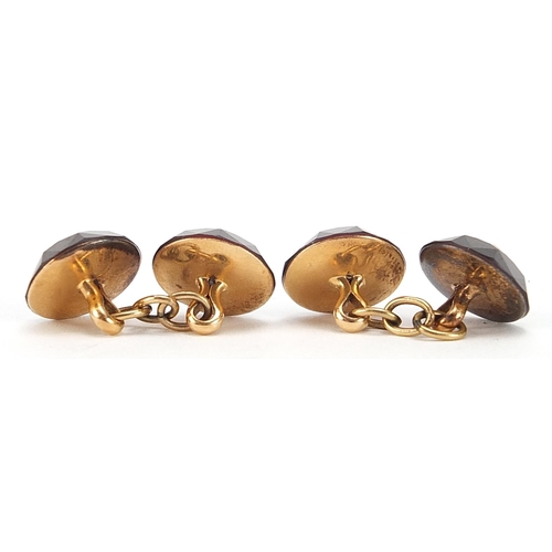 1698 - Pair of unmarked gold facetted garnet coloured and pearl cufflinks, (tests as 9ct gold) 1.2cm in dia... 